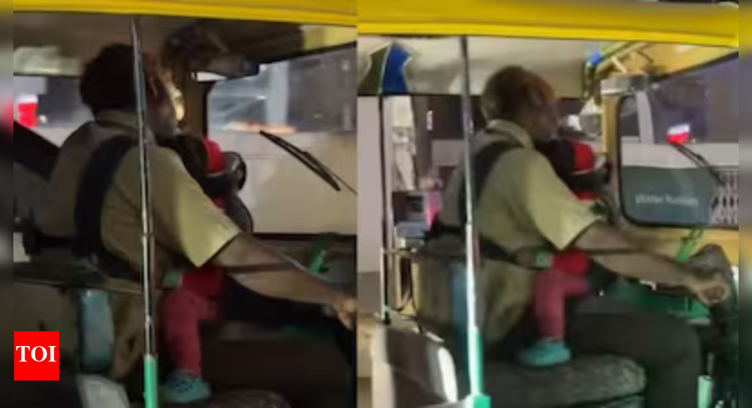 Baby in one arm, wheel in the other: Auto driver cradles infant while driving; video goes viral
